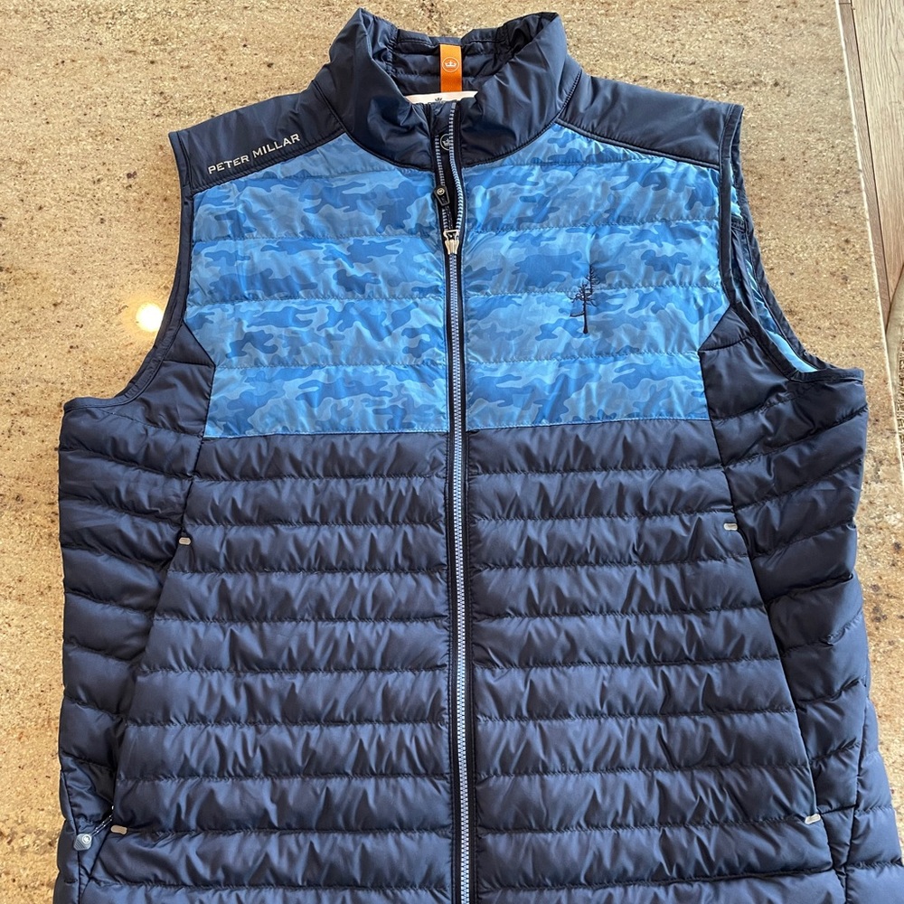 Mens Peter Millar golf vest. Size M. Never been worn, perfect condition.